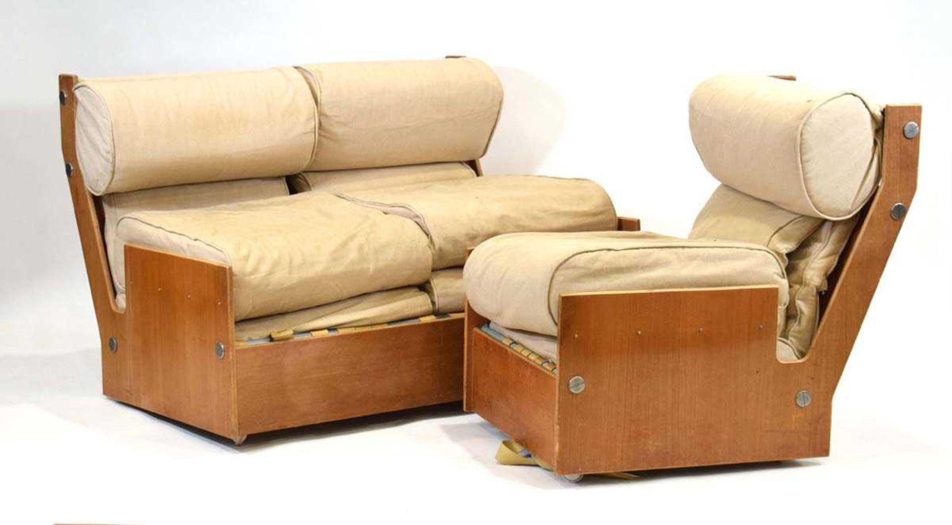 A 1960's ply two-seater sofa and matching armchair, retailed by Harrods 'Way In' section *Sold