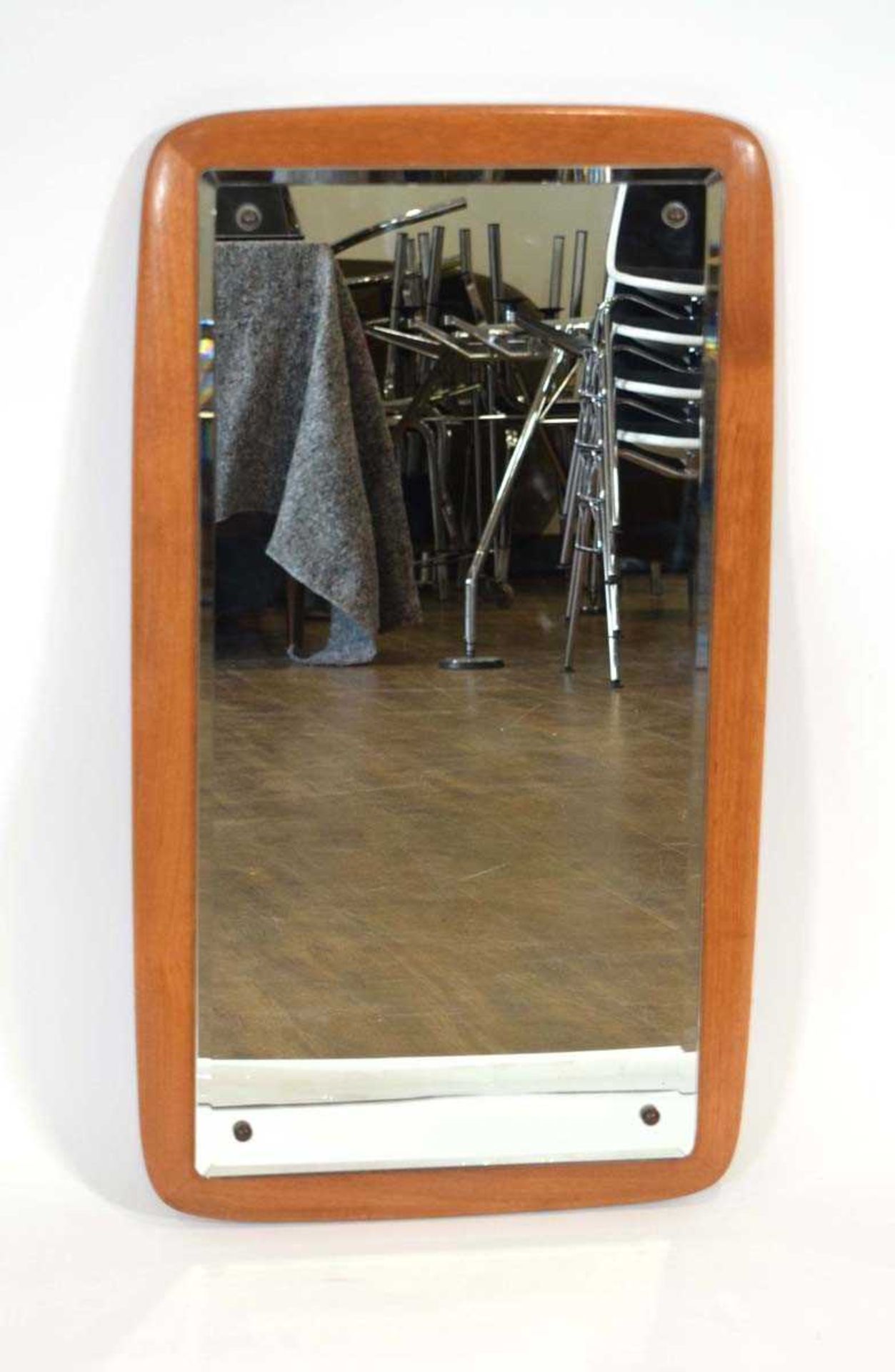 A Danish teak wall mirror of cushioned rectangular form, 74 x 41 cm