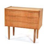 A 1960's Danish oak three-drawer bedside cabinet on tapering legs, w. 60 cm Structurally sound.