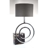 An Art Deco style table lamp, the marble base holding two stainless hoops, h. 80 cm excl.
