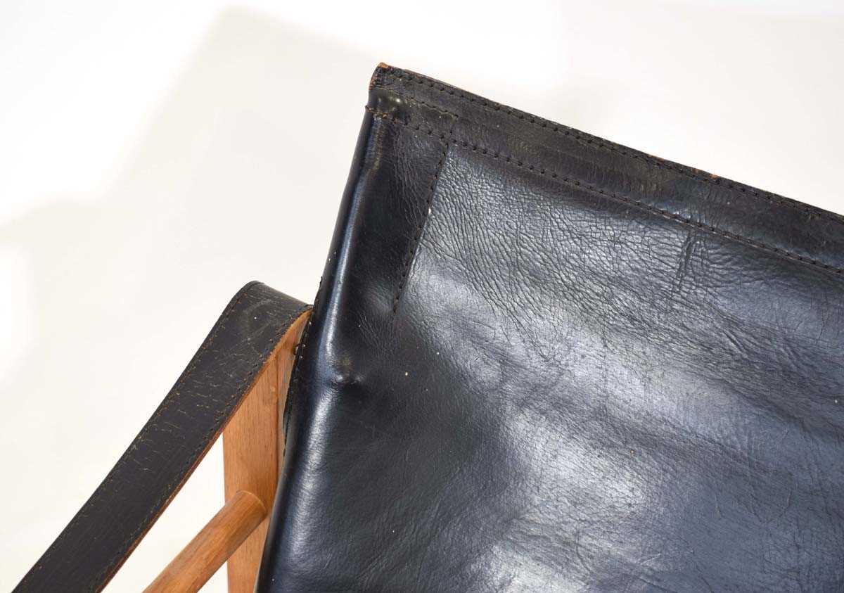 Aage Bruun & Son, a 1960's oak framed 'Safari' chair upholstered in patinated black leather *Sold - Image 3 of 11