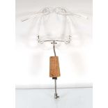 In the manner of Rene Herbst (1891-1982), a modernist lucite and cork mannequin on a flex stem by