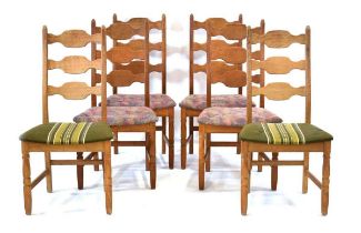 A set of 1960/70's Swedish oak dining chairs by Henning Kjaernulf for EG Moble, upholstered in green