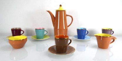 A Palissy 'Mardi Gras' coffee service in bright harlequin colours with 22ct gold plating