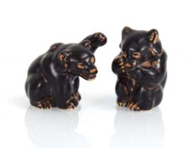 Knud Kyhn (1880-1969) for Royal Copenhagen, two Danish brown-glazed pottery bears, numbered 21435 (