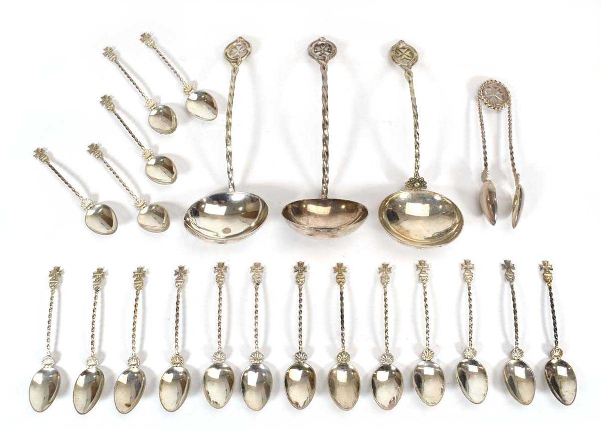 A group of Maltese silver flatware comprising three sauce ladles, a pair of sugar nips and