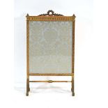 A Louis XVI style giltwood fire screen with a silk embroidered panel and wreath pediment, h. 100 cm