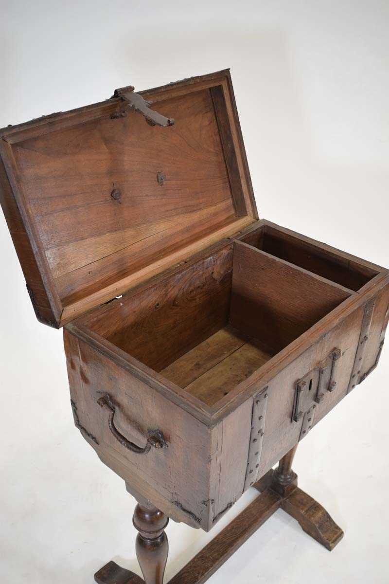 A walnut and metalwork mounted stagecoach strong box with a teak lining, on a later oak standh. 89 - Image 5 of 5