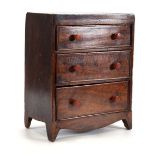 An apprentice piece modelled as a Victorian mahogany chest of three drawers, 24 x 16 x 31 cm