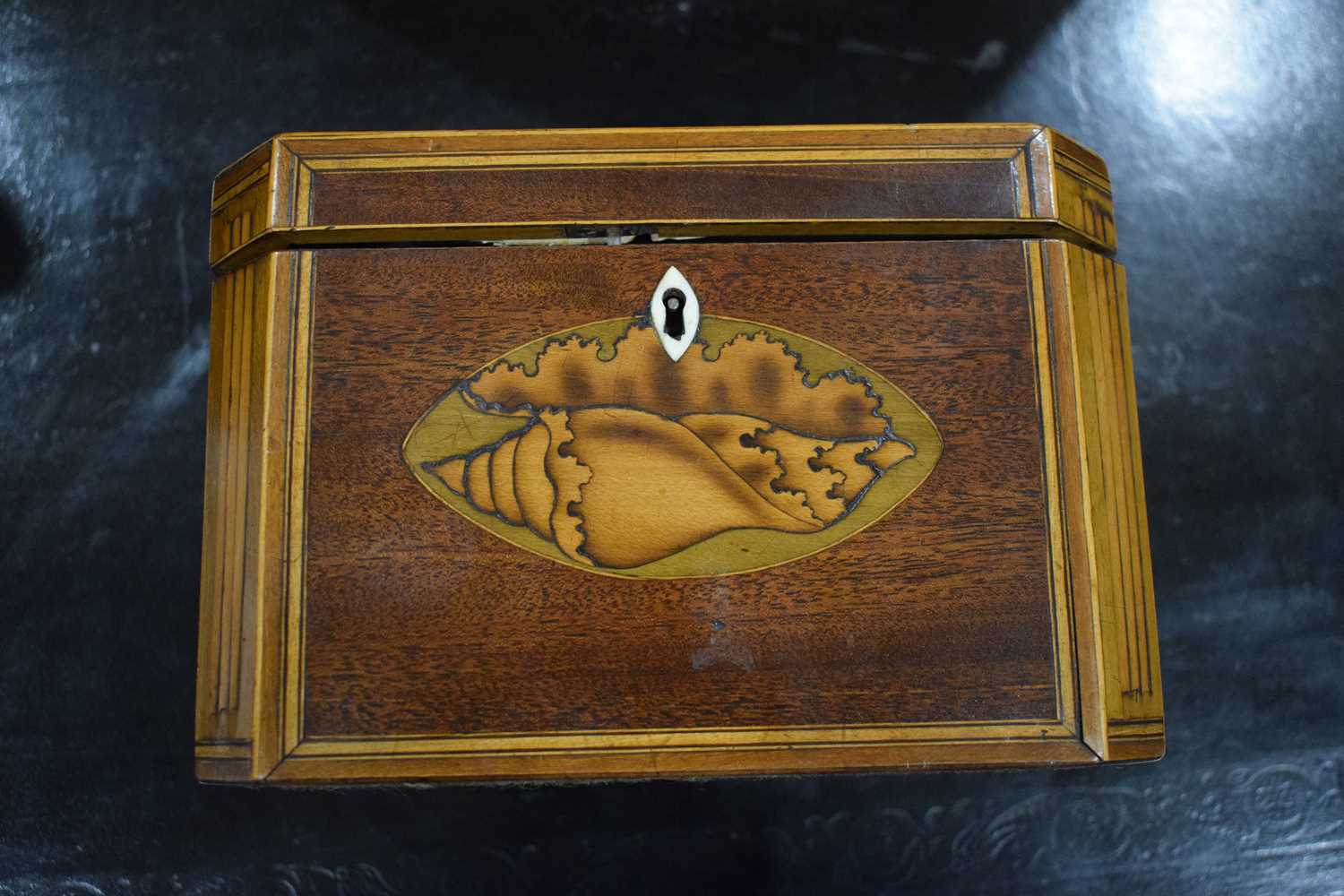 A George III mahogany and strung tea caddy inlaid with a Classical Paetera shell, the interior - Image 11 of 11