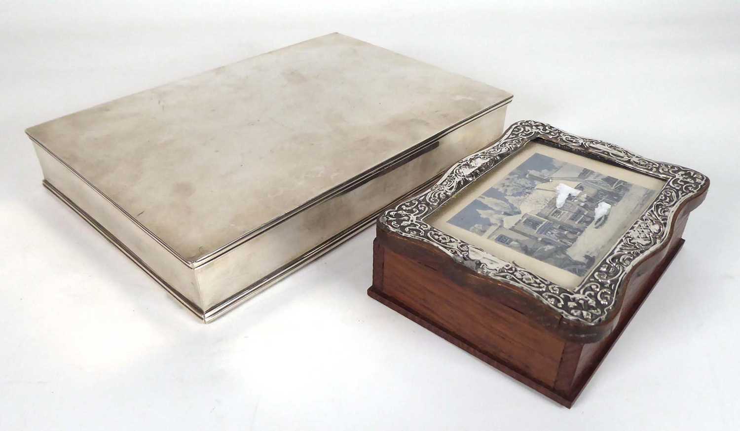 A metalware cigarette box of plain rectangular form, w. 19,5 cm and a silver mounted box, Birmingham