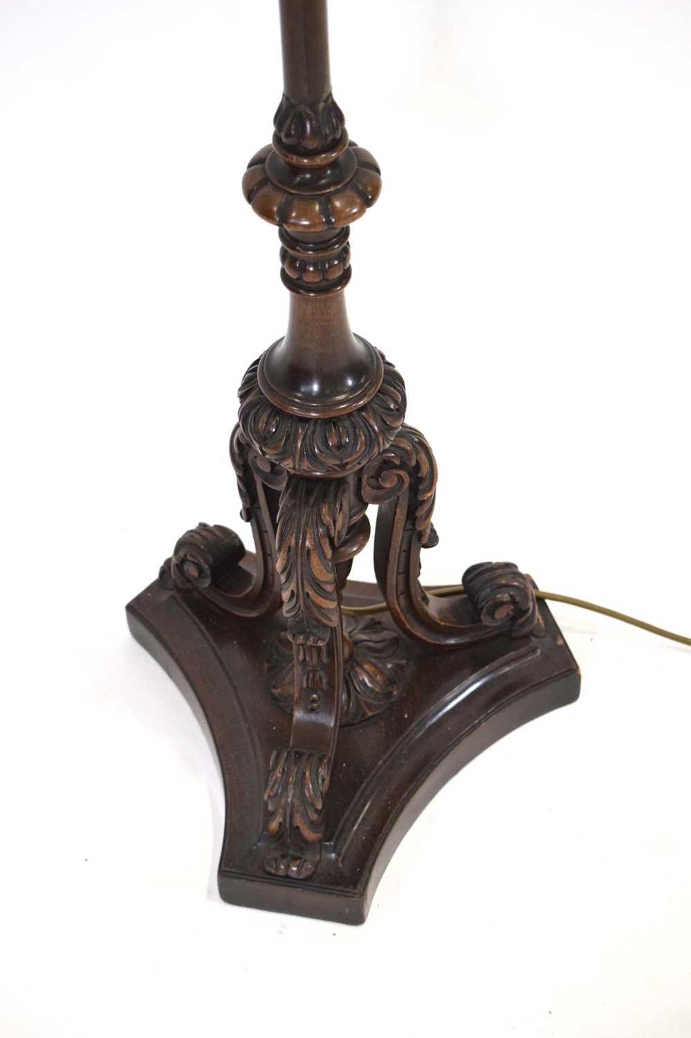 A carved mahogany floor lamp with a cast metal stem, presumably converted from a torchiere - Image 2 of 3