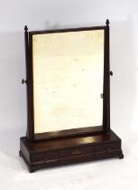 An early 19th century mahogany toilet mirror, the square glass plate within a matching frame, the