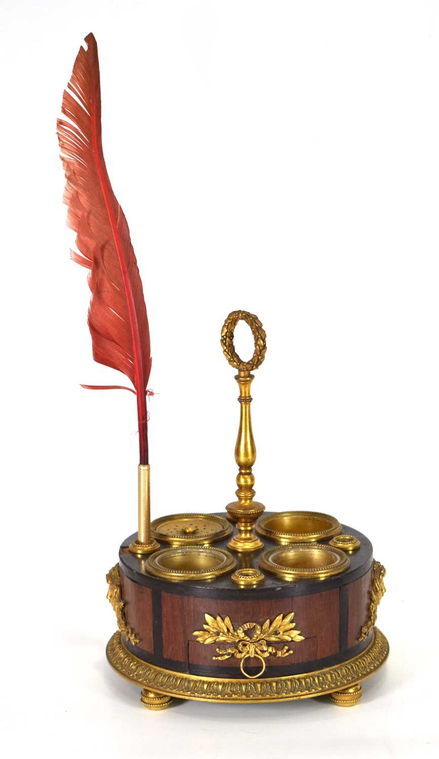 A late 19th century French quill stand, the rosewood and ebonised body with brass mounts,