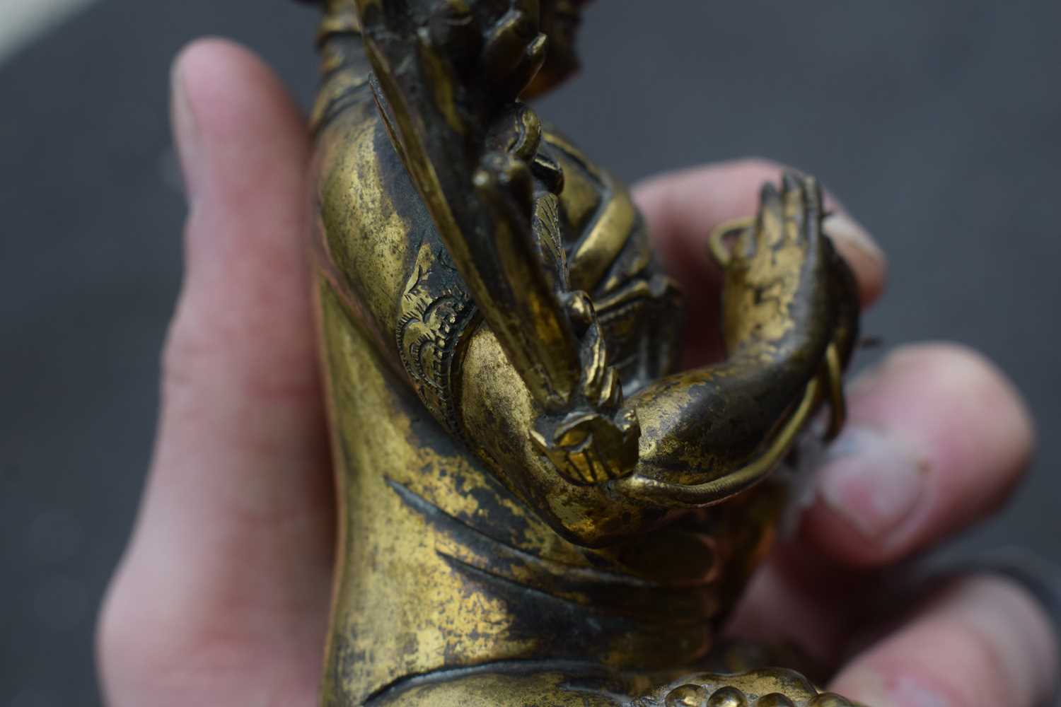 A 19th century Tibetan gilt bronze figure modelled as Tsongkhapa, h. 18 cmSome tarnishing. Base - Image 17 of 28