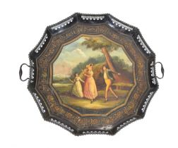 A 20th century tole piercework tray decorated with a classical landscape depicting a dandy and his