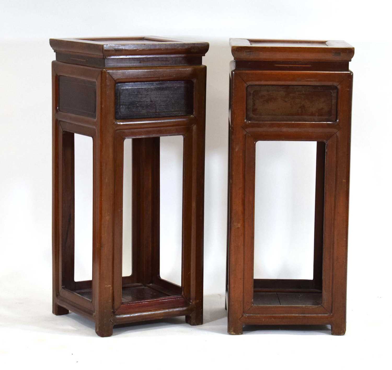 A pair of 20th century Chinese lamp tables or night stands, each with a single drawer over a