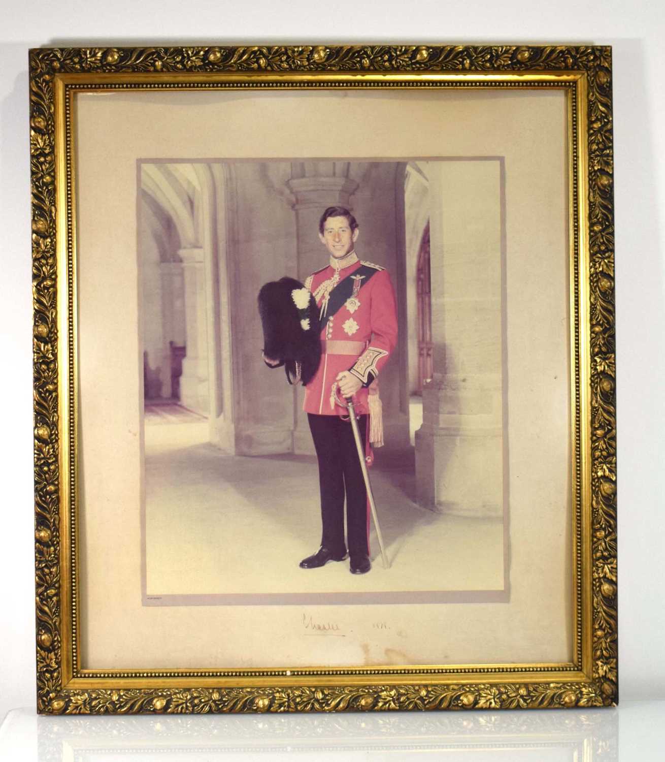 After Peter Grugeon (1918-1980),A full length portrait of Charles III, as the Prince of Wales,signed