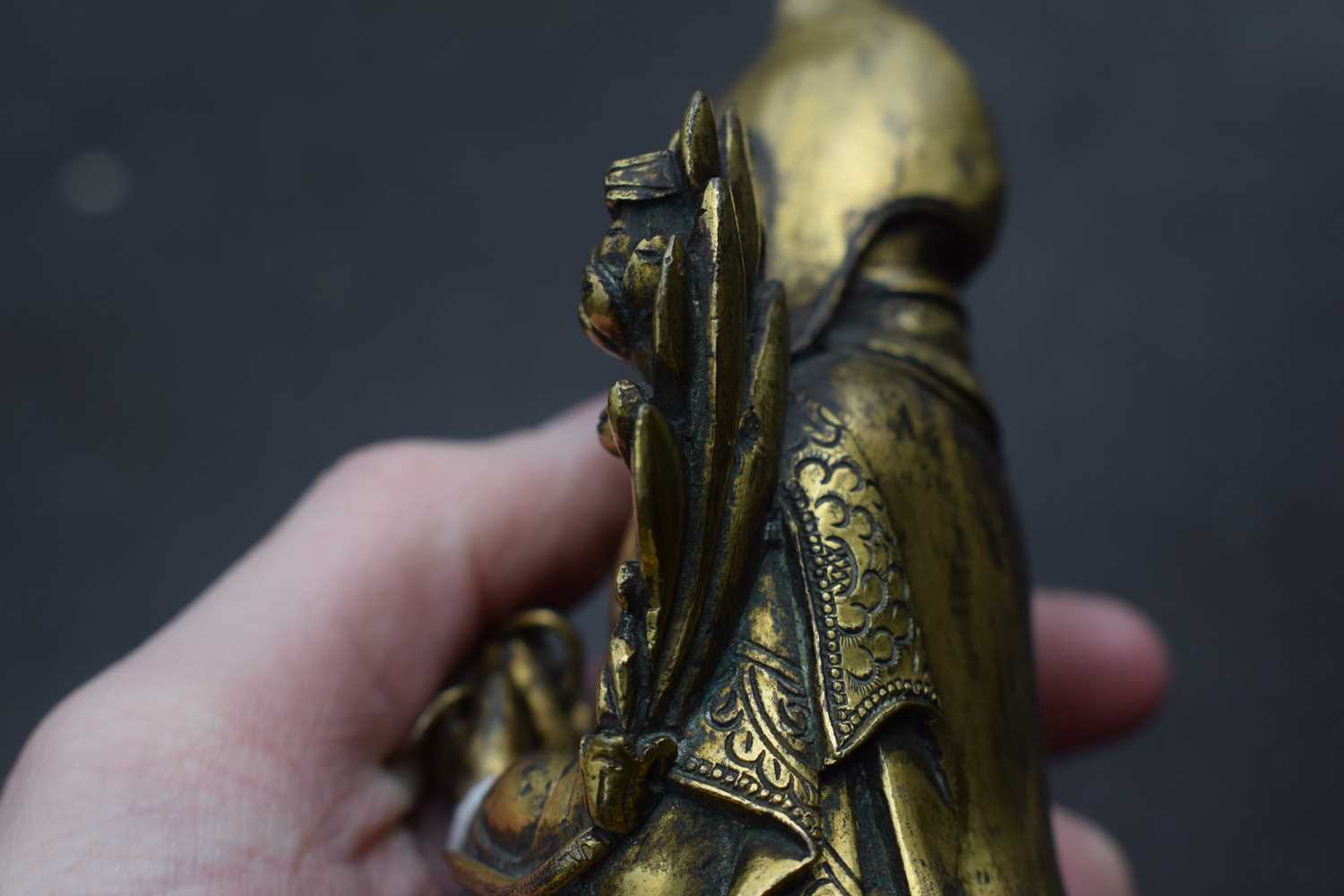 A 19th century Tibetan gilt bronze figure modelled as Tsongkhapa, h. 18 cmSome tarnishing. Base - Image 18 of 28