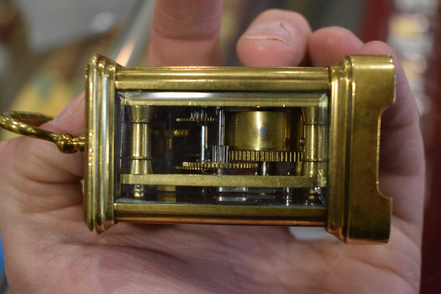 A late 19th century French miniature carriage timepiece in a brass and five-glass case, h. 7 cm, - Image 5 of 7