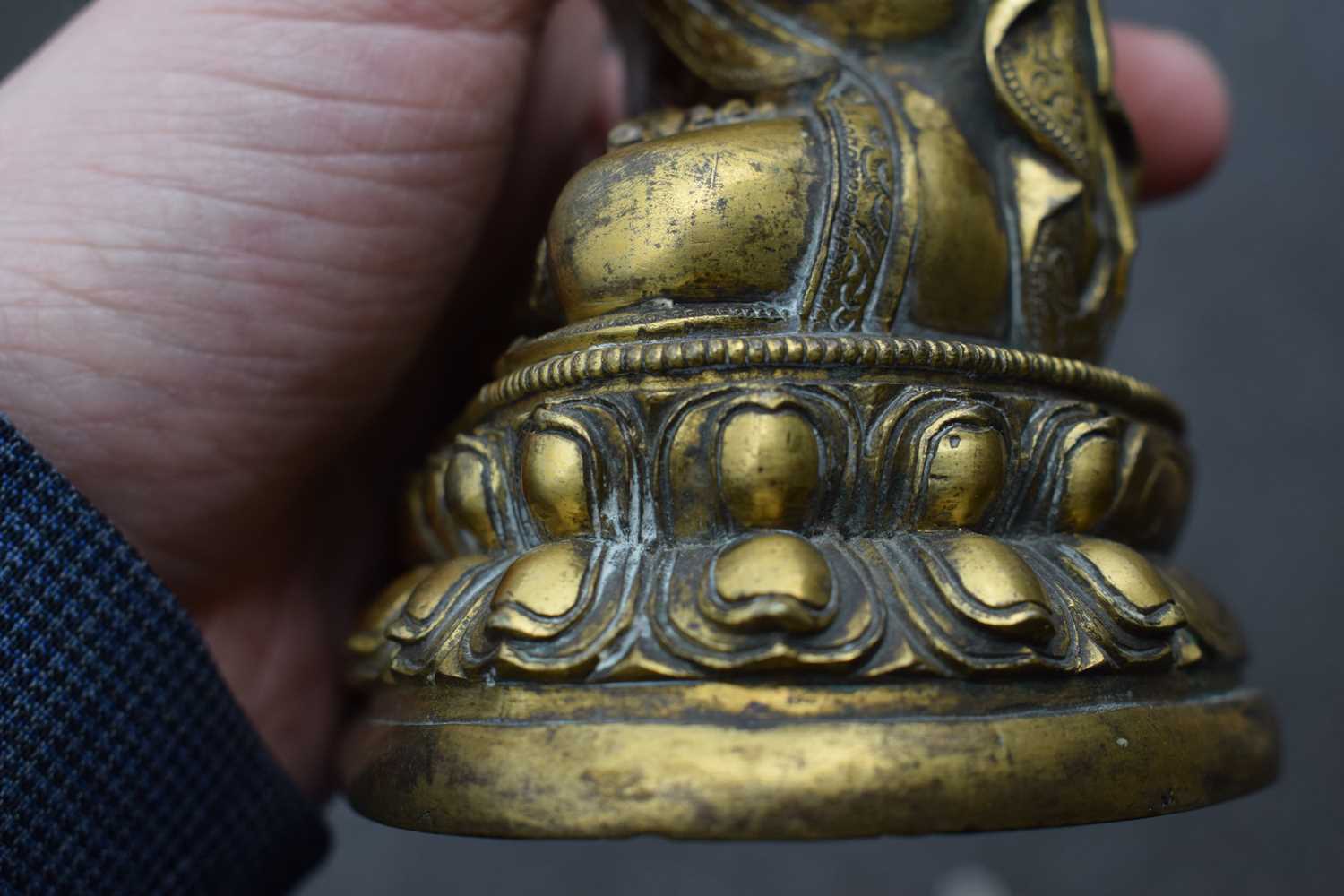 A 19th century Tibetan gilt bronze figure modelled as Tsongkhapa, h. 18 cmSome tarnishing. Base - Image 16 of 28