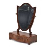 A Victorian mahogany and walnut crossbanded toilet mirror with a shield-shaped back over a