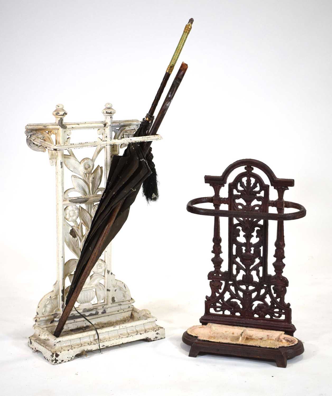 A late 19th/early 20th century white painted cast-iron stick and umbrella stand, h. 63 cm,