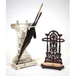 A late 19th/early 20th century white painted cast-iron stick and umbrella stand, h. 63 cm,