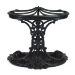 A Victorian Coalbrookdale cast iron stick and umbrella stand, the top divided into five segments