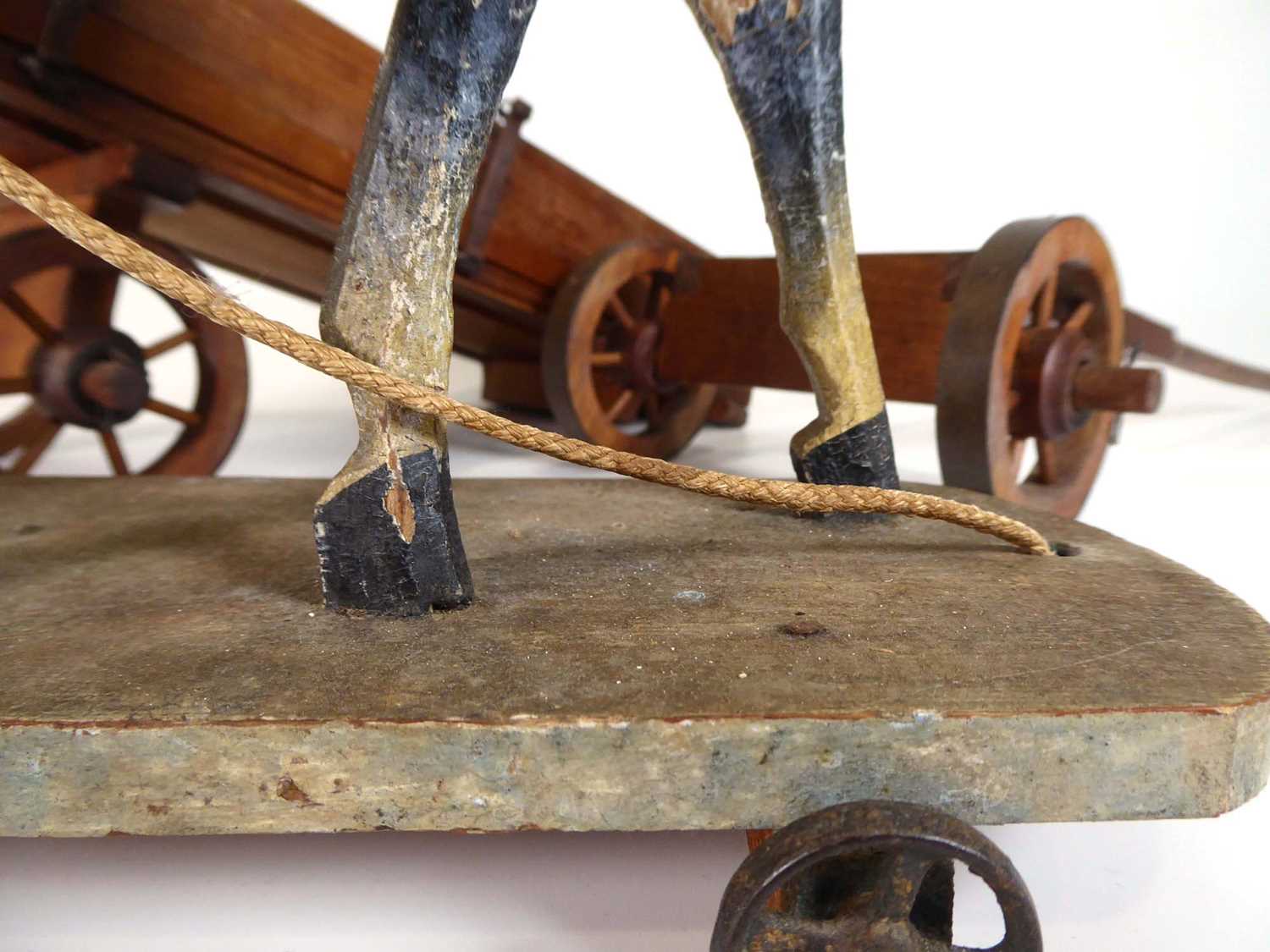A late 19th/early 20th century painted pine pull along horse, l. 31 cm and an associated cart (2) - Image 3 of 8