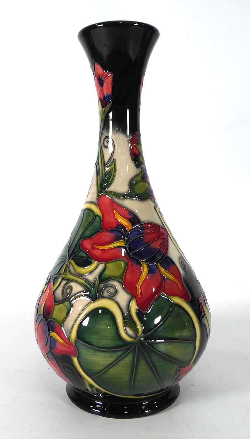 A Moorcroft bottle vase of slender form decorated in the Palmata pattern, h. 23 cm