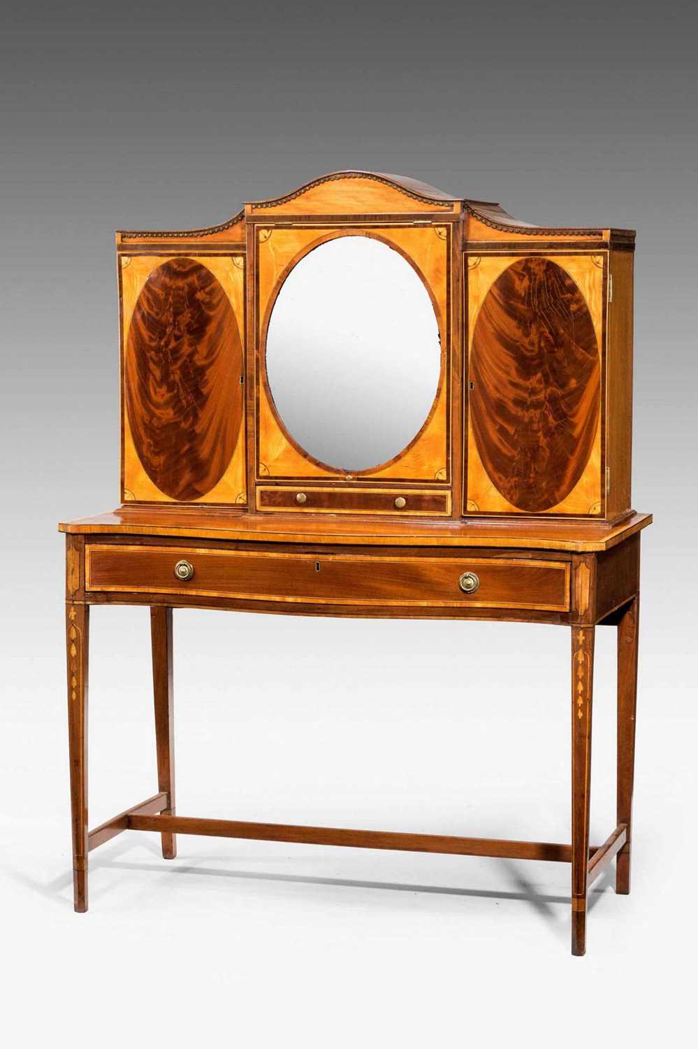 A George III Irish flame mahogany, satinwood and crossbanded dressing table, the superstructure with