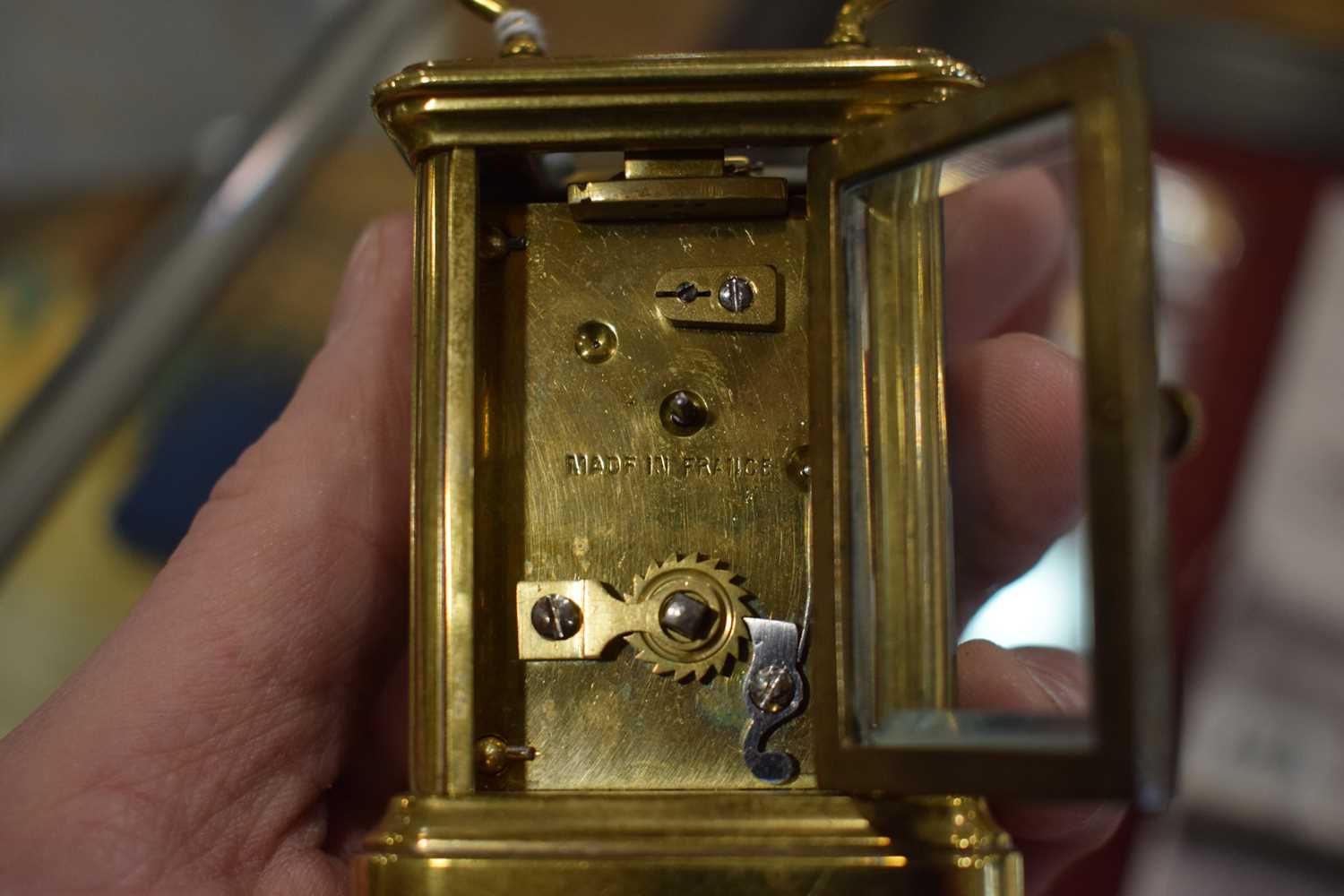 A late 19th century French miniature carriage timepiece in a brass and five-glass case, h. 7 cm, - Image 4 of 7