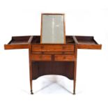 A George III gentleman's 'campaign' dressing table, the marquetry envelope surface opening to reveal