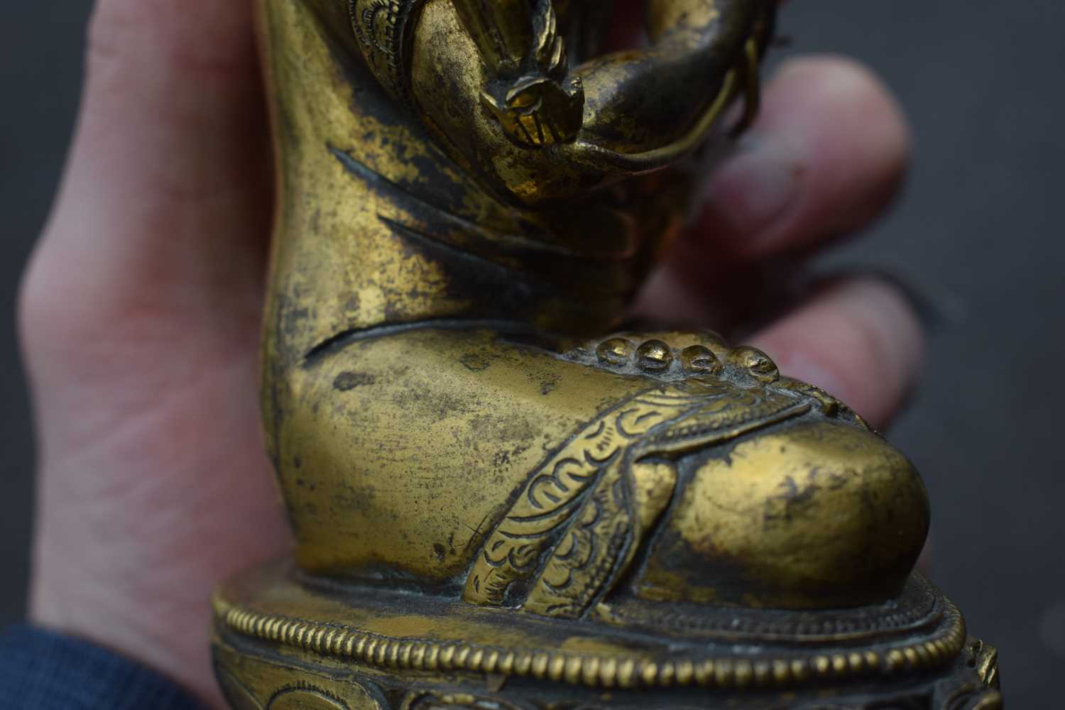 A 19th century Tibetan gilt bronze figure modelled as Tsongkhapa, h. 18 cmSome tarnishing. Base - Image 14 of 28