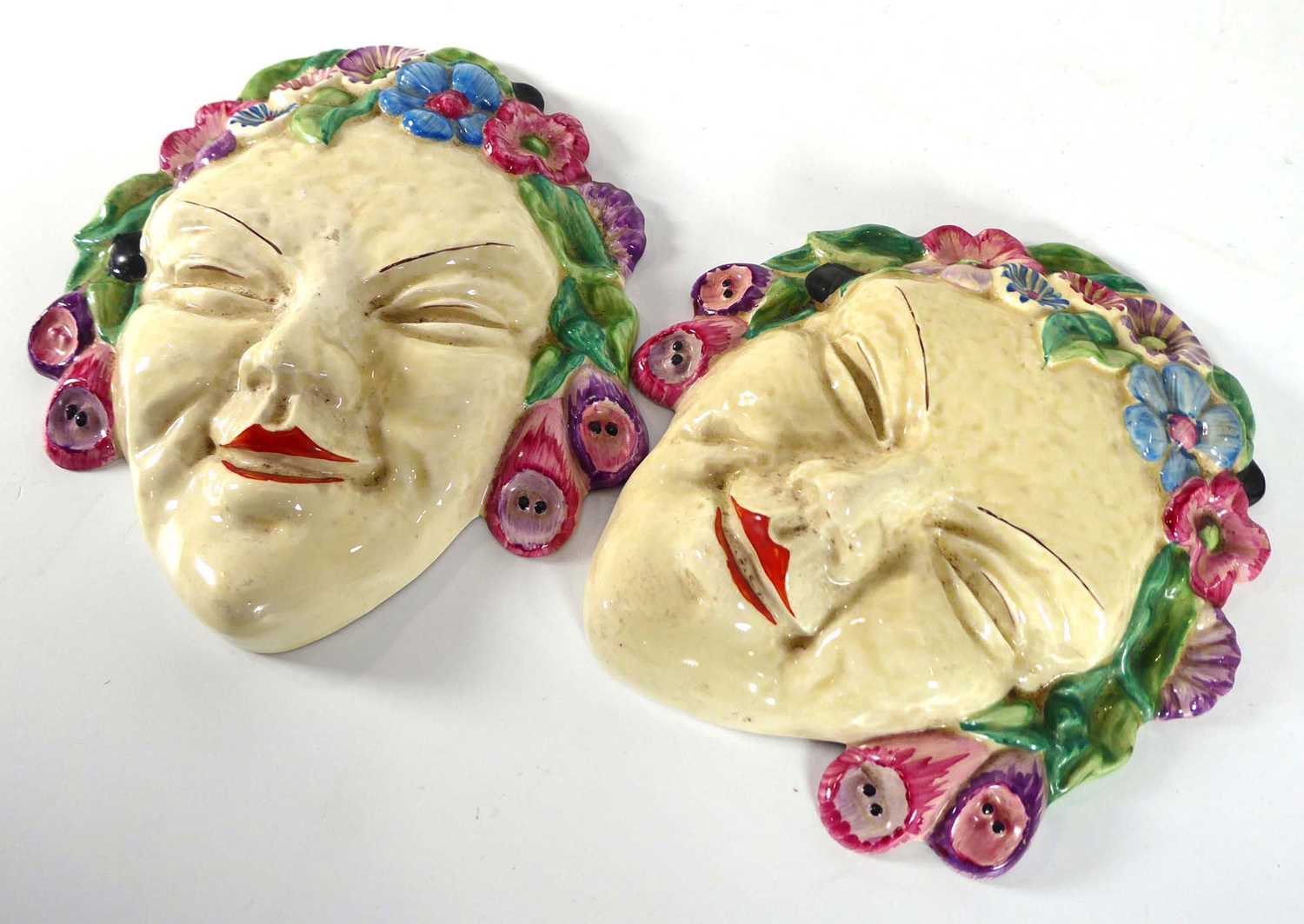 A pair of Clarice Cliff Bizarre wall masks, each depicting a female beauty wearing a floral - Image 4 of 8