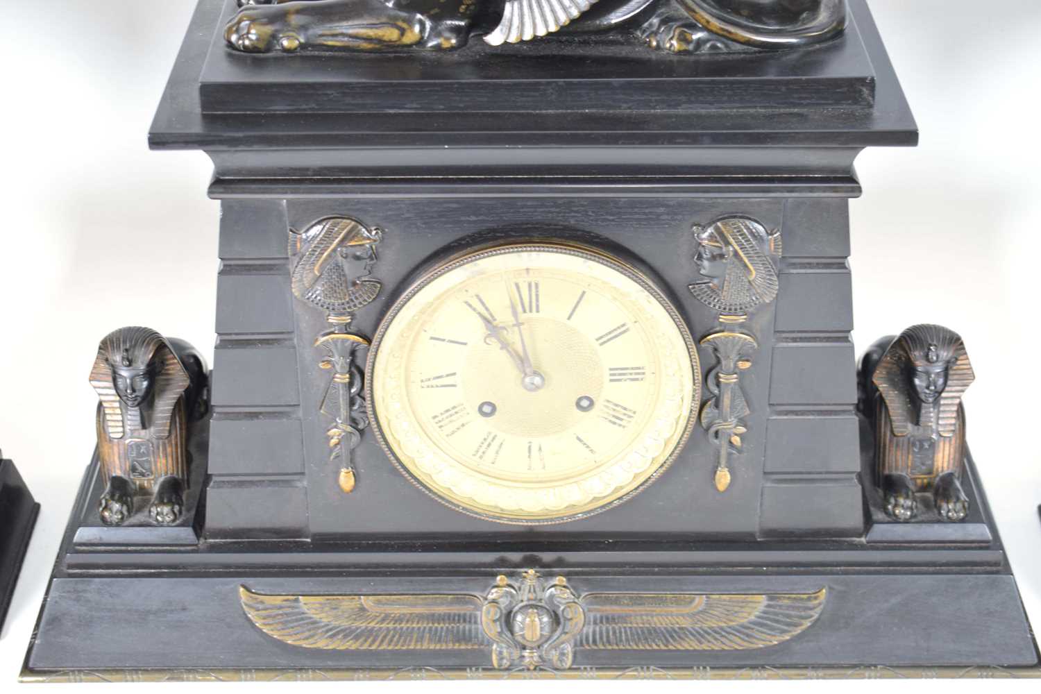 A Victorian 'Egyptian Revival' mantle clock and garnitures, the slate and marble body surmounted and - Image 4 of 4