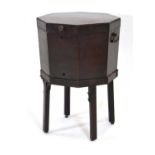 A George III mahogany octagonal wine cooler, with a zinc liner, brass handles and square chamfered