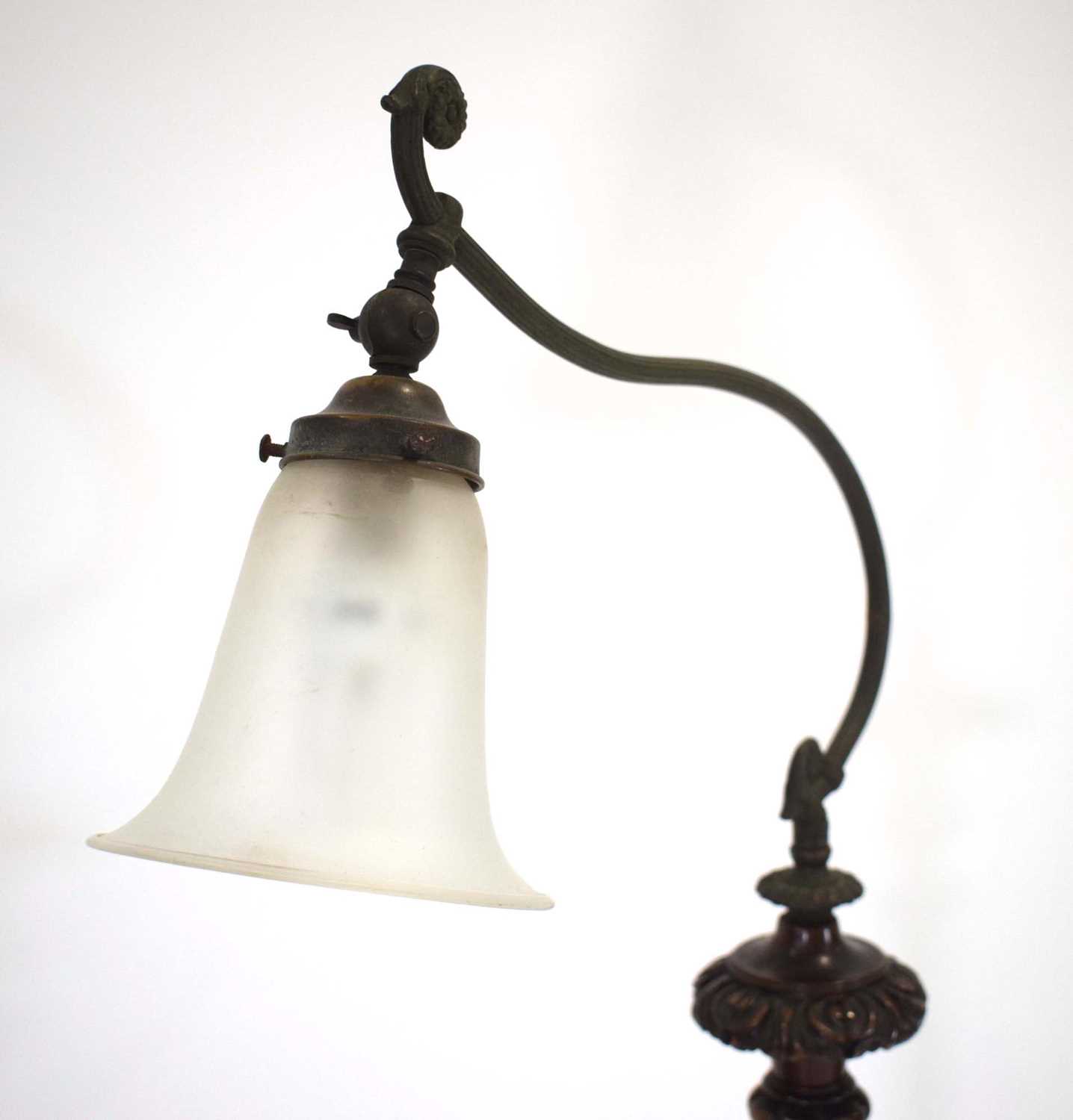 A carved mahogany floor lamp with a cast metal stem, presumably converted from a torchiere - Image 3 of 3