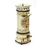 An enamelled cylindrical stove with cast-metal fitments and decorated with putti and foliage, h.