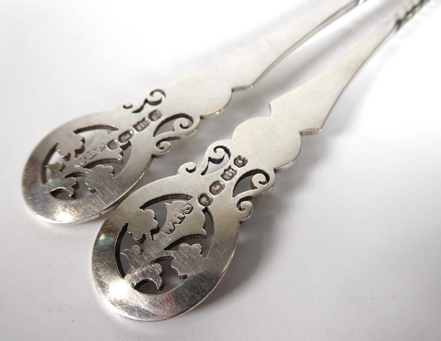 A pair of mid-19th century silver parcel gilt berry spoons, the bowls later engraved in the - Image 3 of 3