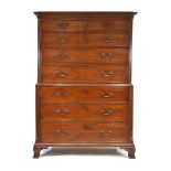 A George III mahogany chest-on-chest with an arrangement of seven long graduated drawers, on ogee