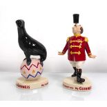 Two limited edition Coalport Guinness figures modelled as a Sealion and a Ringmaster, 670/2000 and