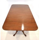A good-quality reproduction twin pedestal dining table in walnut with two fitted leaves, total 320 x