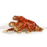 A Royal Dux figure modelled as a pair of tigers, h. 17 cm (af)Chipped