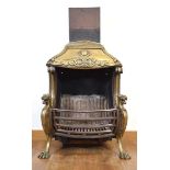 A Victorian brass and cast-metal fireplace incorporating a basket, pair of figural lion supports,