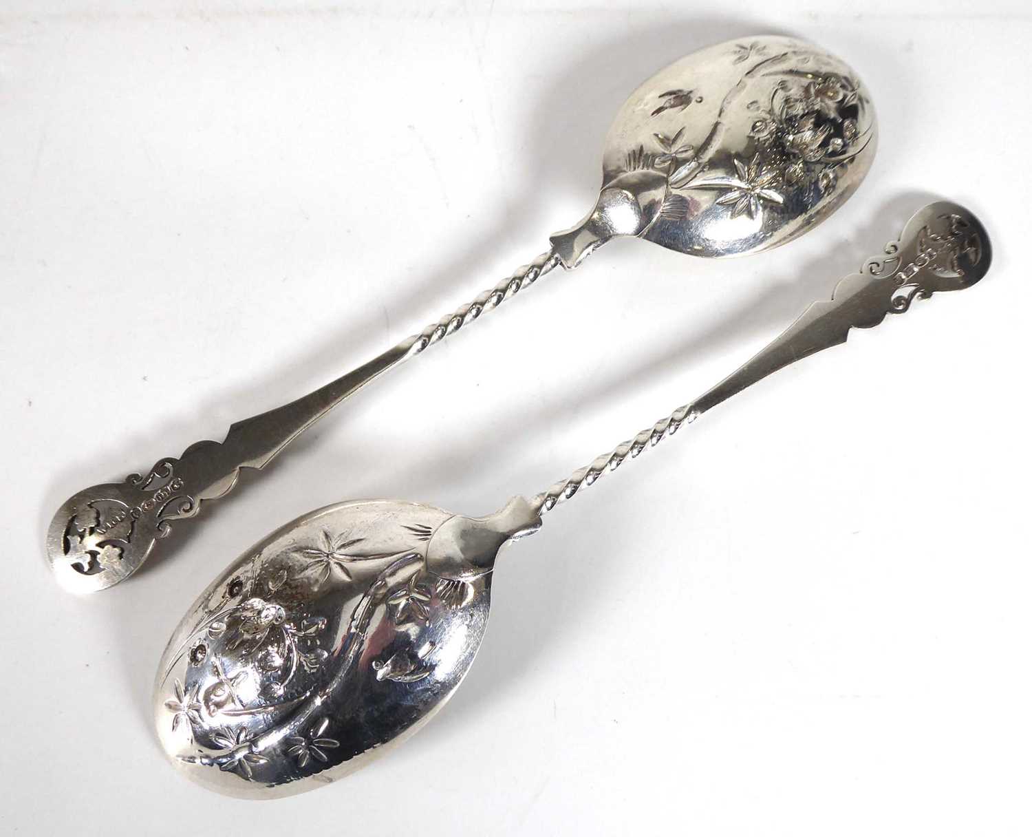 A pair of mid-19th century silver parcel gilt berry spoons, the bowls later engraved in the - Image 2 of 3