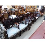 A set of eight Hepplewhite-style shield back dining chairs including two carvers, the mahogany
