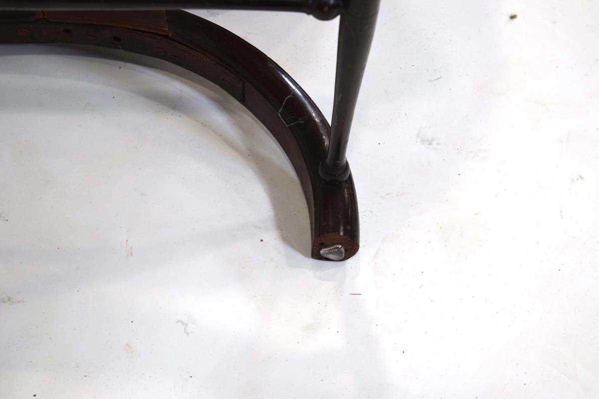 A 19th century mahogany and brown leather club armchair on a carved X-frame bearing a mask of a - Image 12 of 17