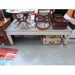 A painted and parcel gilt coffee table of imposing form, the centre with a needlework tapestry panel